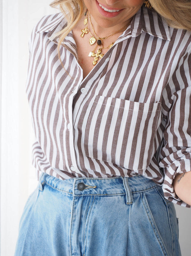 Blusas, camisas e tops Femininos. Camisas brancas, estampadas ou lisas. Descubra toda a coleção de camisas online.