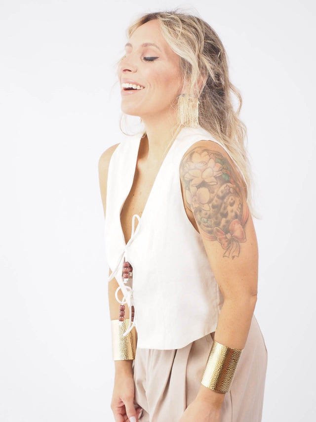 Colete de Linho com Missangas: O toque especial que falta no seu look!