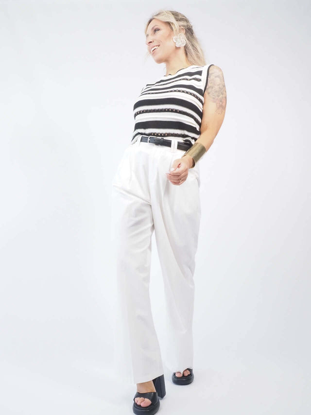 Calças com fecho zipper e botão: O detalhe que faz a diferença no seu look