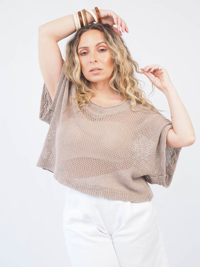 Pull en tricot perforé