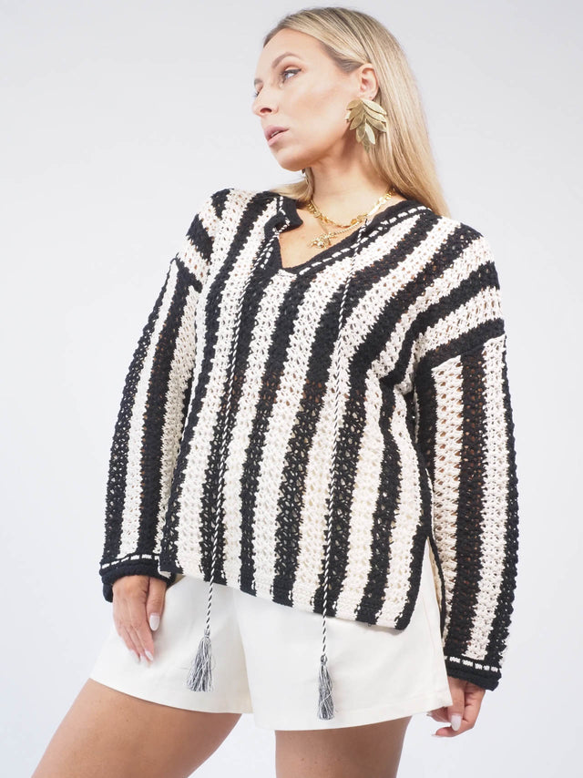 Camisolas de malha às riscas: a peça chave para um guarda-roupa moderno