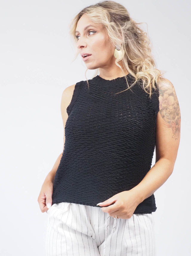 Colete de ponto aberto: a peça perfeita para um toque de elegância