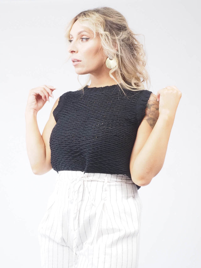 Colete de malha aberta: Adicione um toque de elegância ao seu look!