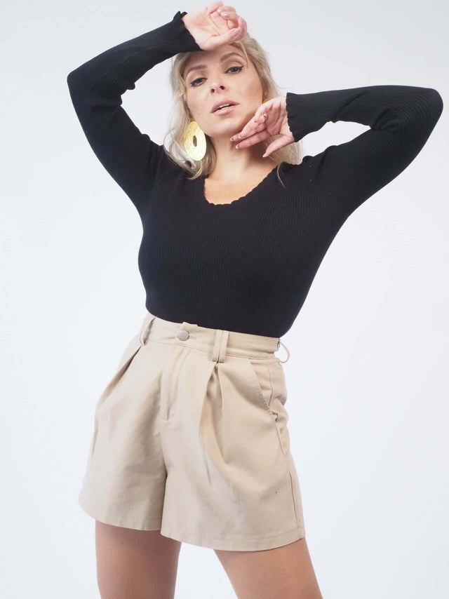 Descubra a elegância e o conforto da camisola de malha