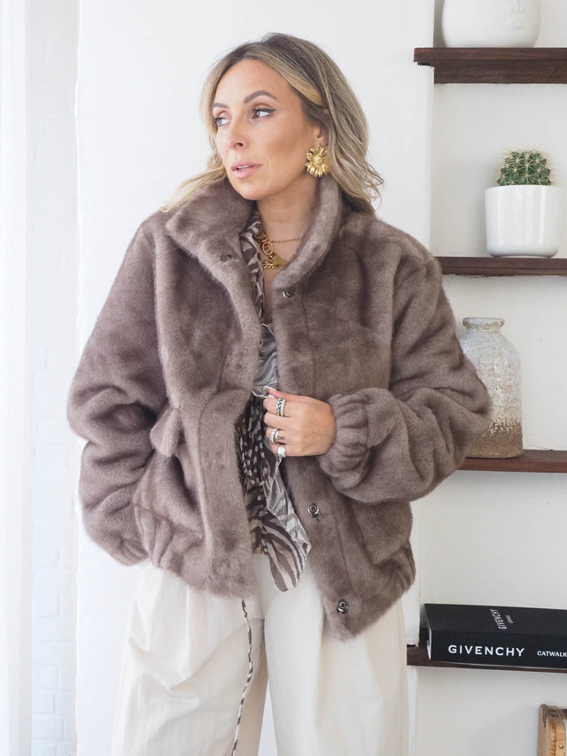 Manteau de fourrure avec poches