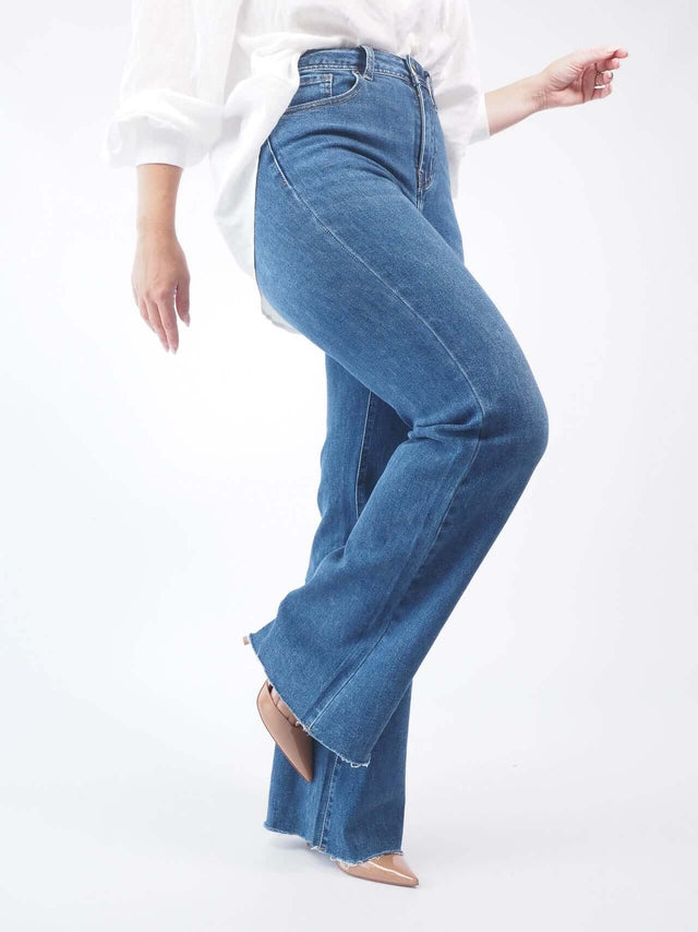 Calças de Ganga Flare Fit: Valorize Suas Curvas com Elegância