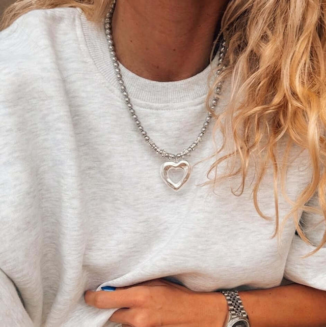 Colliers de perles d'hématite avec grand cœur en argent