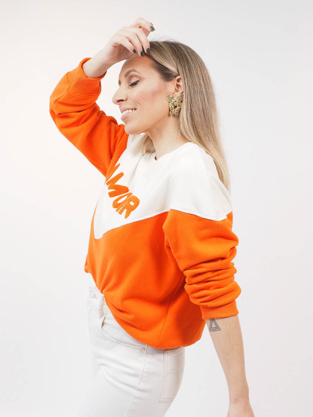 Sweatshirt de manga comprida com duas cores.