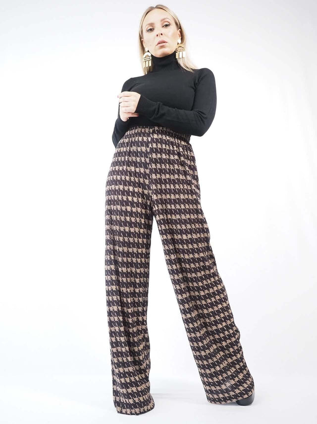 Calças pantalonas de mulher, parna larga, de cinta alta confortaveis, para look super práticos e femininos.