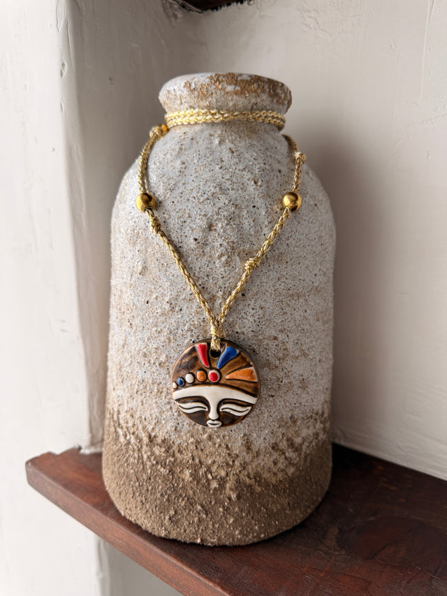 Rope necklace with medal