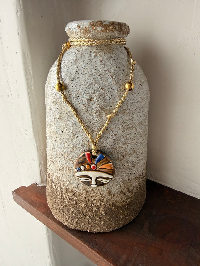 Rope necklace with medal