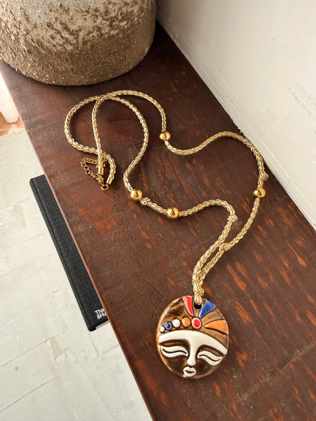 Rope necklace with medal