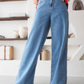 Wide leg high-waisted denim jeans with elastic waistband for comfort and style, perfect for everyday wear.