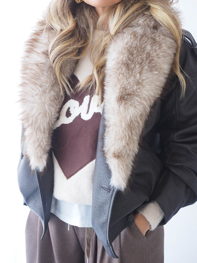 Manteau en fausse fourrure avec fourrure