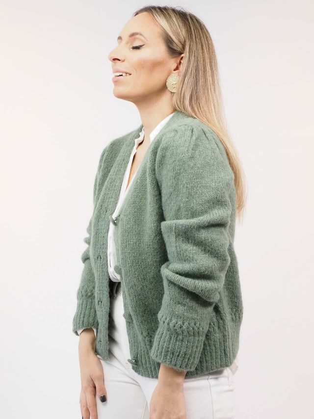 Com punhos com nervuras acrescentam um toque casual a este casaco de malha.