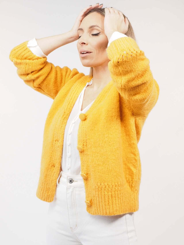 Com punhos com nervuras acrescentam um toque casual a este casaco de malha.